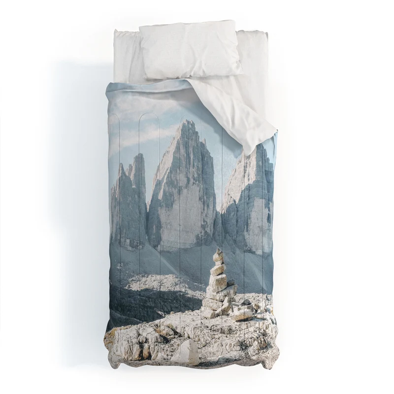 Dolomites Italy I Stone cairn in front of Tre Cime di Lavaredo peaks in the Italian Alps mountains Comforter