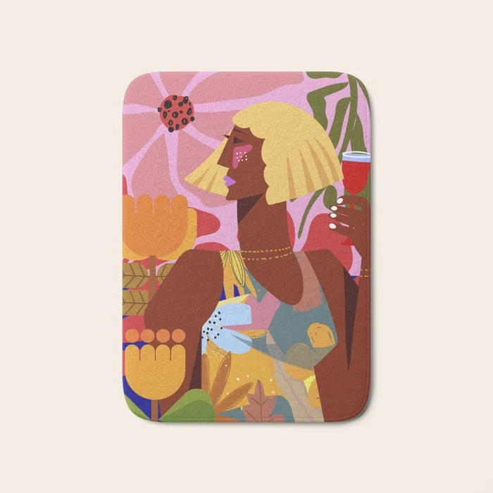 Woman with wine in floral garden Bath Mat