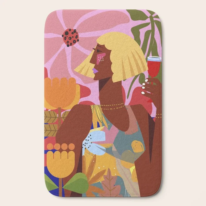 Woman with wine in floral garden Bath Mat