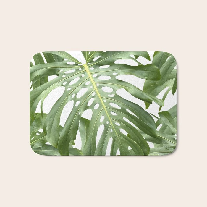 Vibrant tropical foliage on white Bath Mat