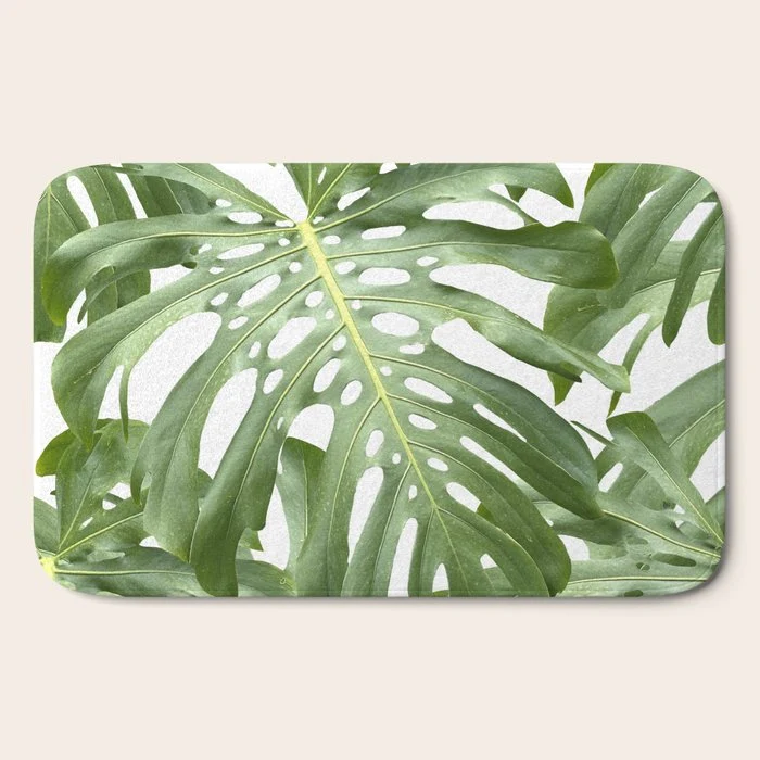 Vibrant tropical foliage on white Bath Mat
