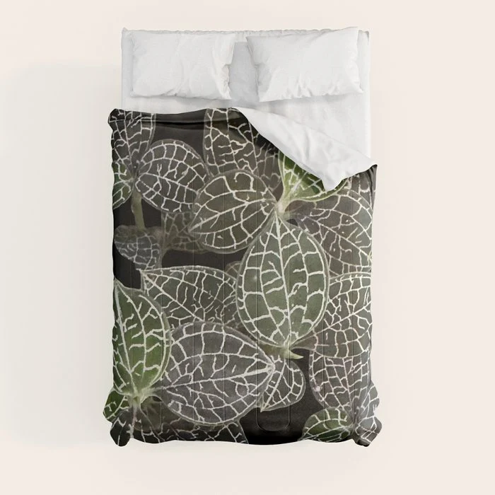 Elegant leaf skeleton foliage on black Comforter