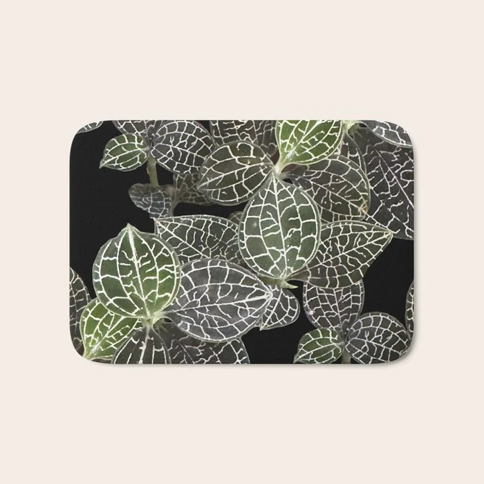 Elegant leaf skeleton foliage on black Bath Mat