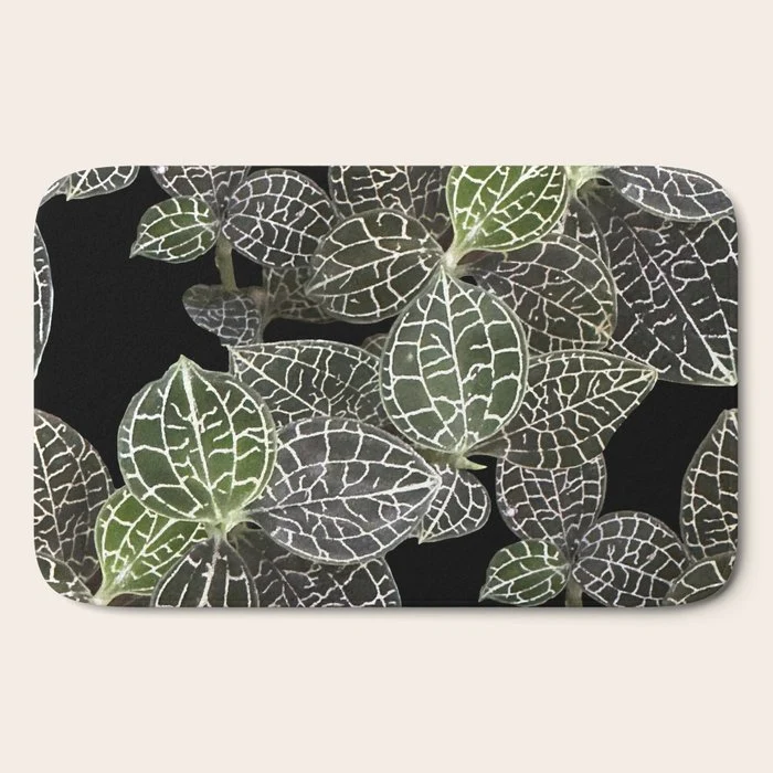 Elegant leaf skeleton foliage on black Bath Mat